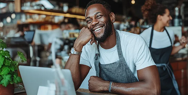 Liquid Intelligent Technologies has introduced BIA service to deliver reliable, high-speed, and secure internet for South African businesses. (Image source: Liquid Intelligent Technologies) African_man_sitting_with_the_laptop
